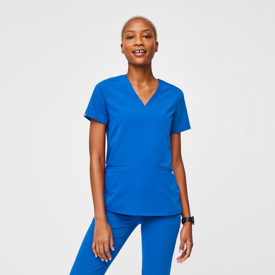 https://creative.wearfigs.com/asset/774e4148-42c2-488e-8cd9-e2fd0c536203/SQUARE/Women-Casma-Two-Pocket-Scrub-Top_royalblue-1