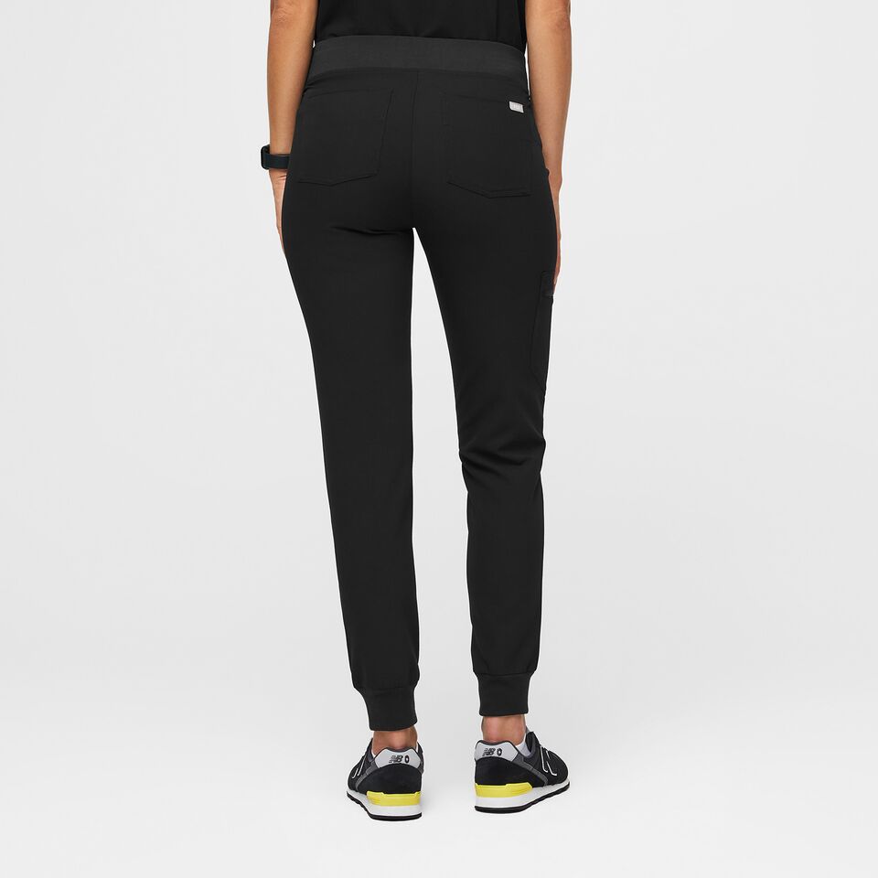 https://www.wearfigs.com/i/bynder/m/2f6dcf08260a3723/SQUARE-W_Zamora_Pant_Black_Core_Updated_Background_2022_-05